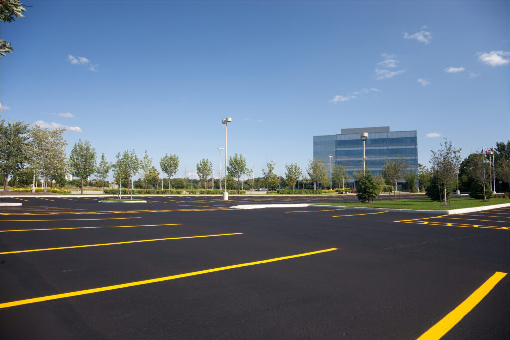 image of an fully maintained asphalt repaired parking lot in Nashville TN office building parking lot