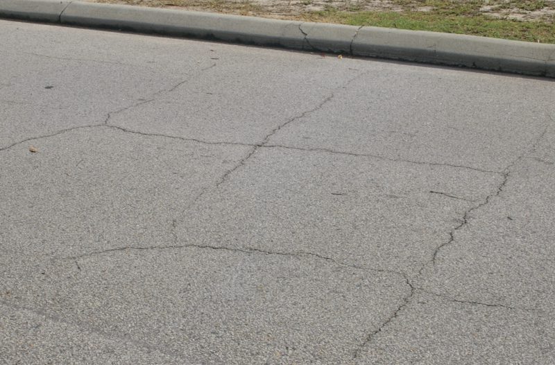 This image is an example of block cracking in pavement that calls for asphalt patching in West Nashville, TN.