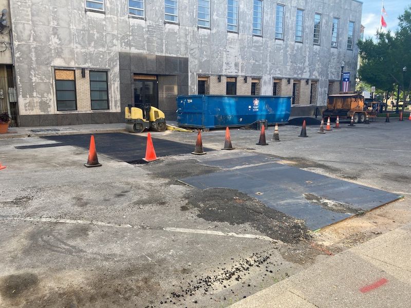 Image of Infrared Asphalt Trench Repair for Saloon inside Old Judicial Building near Historic Courthouse in Downtown Square Murfreesboro Rutherford County TN. Job was done by Gaddes Strategic, LLC